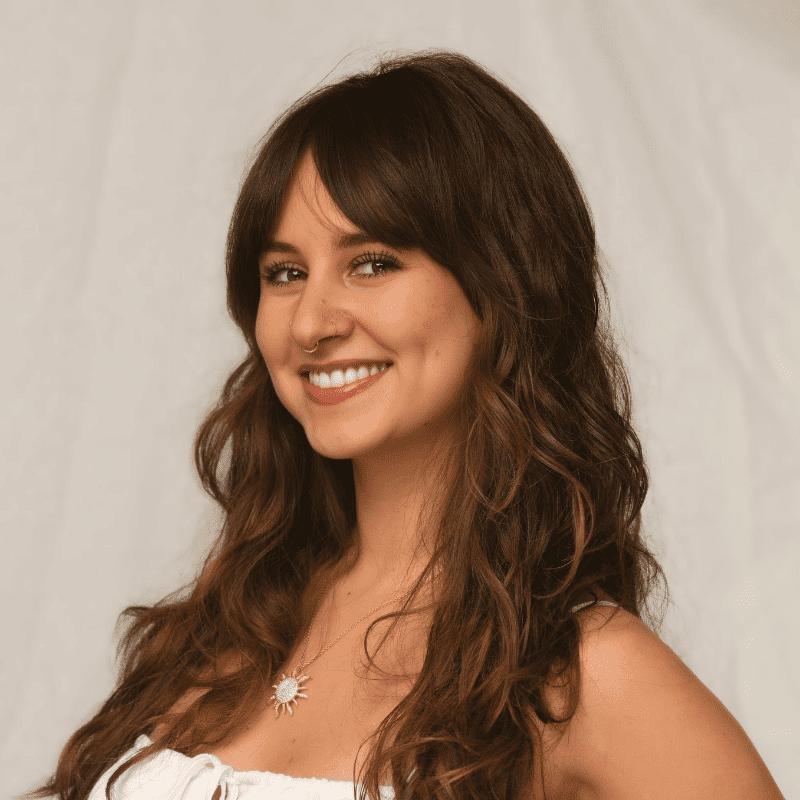 Portrait of Alicia Desousa, a professional stylist at Michael Anthony Salon, showcasing their expertise and style.