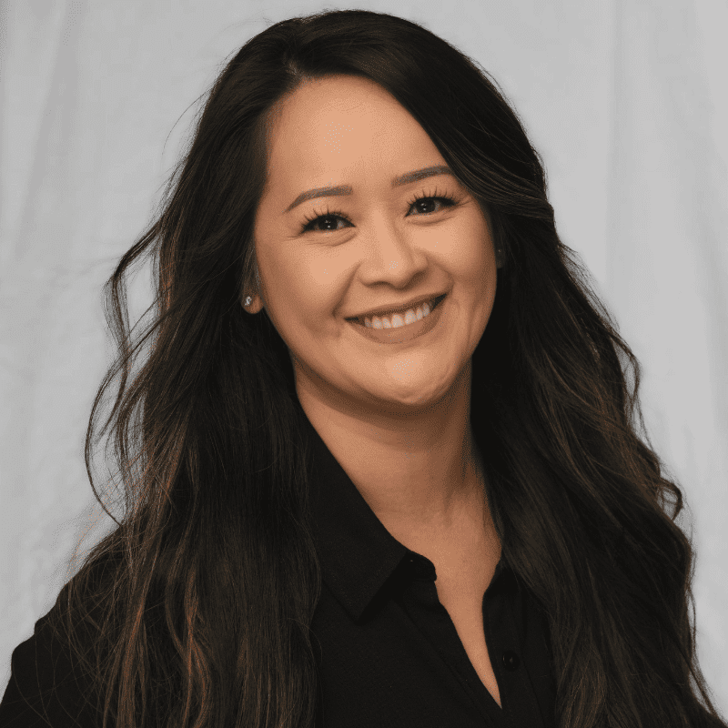 Portrait of Tuan Anh Ricci, a professional stylist at Michael Anthony Salon, showcasing their expertise and style.