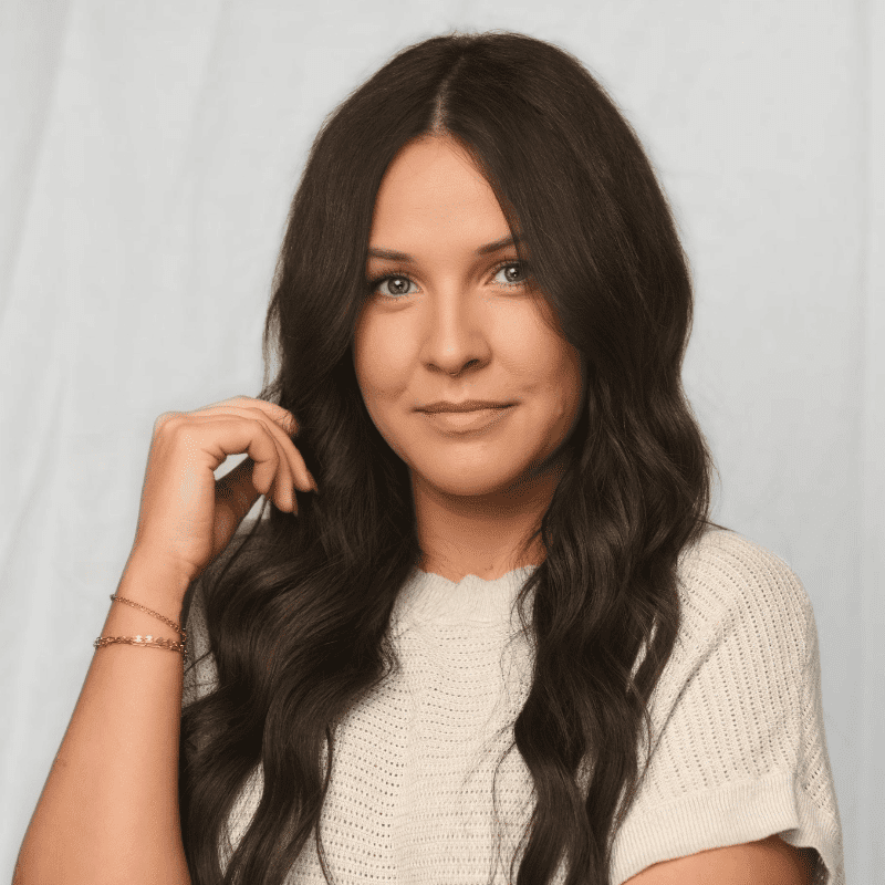 Portrait of Ashley Marshall, a professional stylist at Michael Anthony Salon, showcasing their expertise and style.