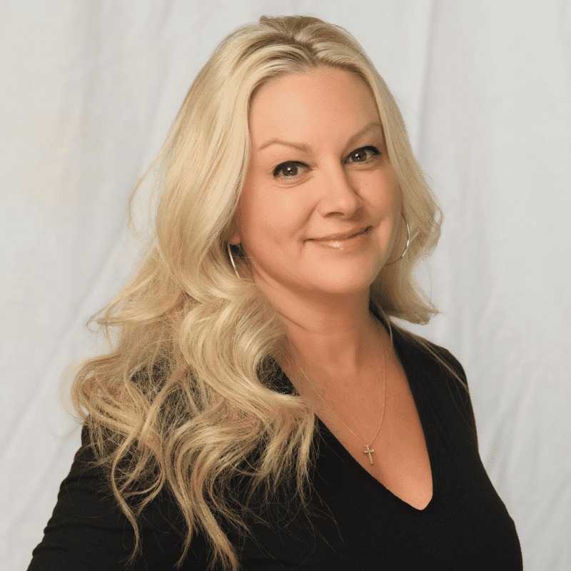 Portrait of Tiffany Correra, a professional stylist at Michael Anthony Salon, showcasing their expertise and style.