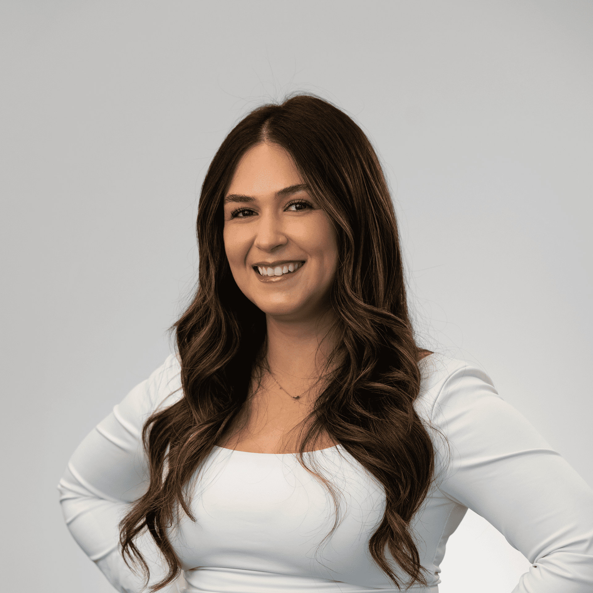 Portrait of Jesenia Munoz, a professional stylist at Michael Anthony Salon, showcasing their expertise and style.