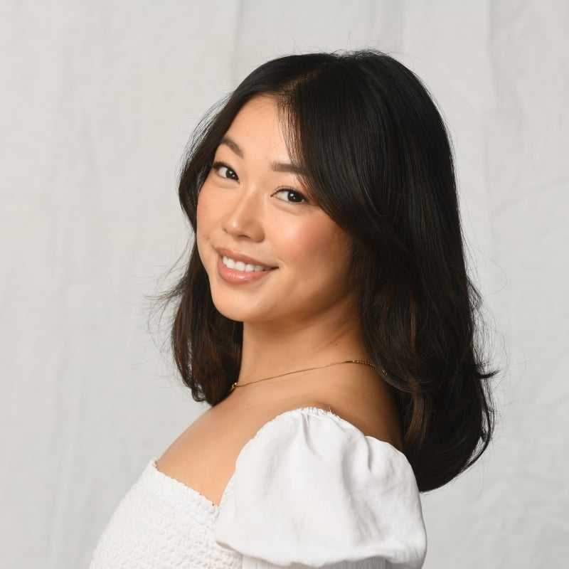 Portrait of Ayumi Canton, a professional stylist at Michael Anthony Salon, showcasing their expertise and style.