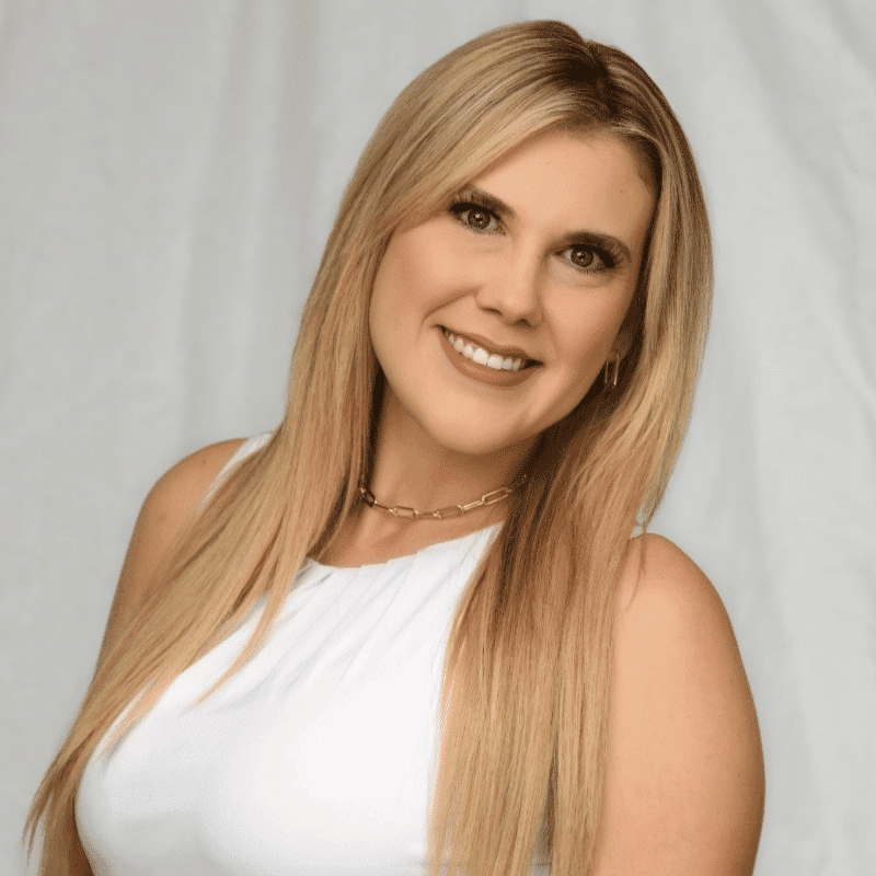 Portrait of Taylor Dariano, a professional stylist at Michael Anthony Salon, showcasing their expertise and style.