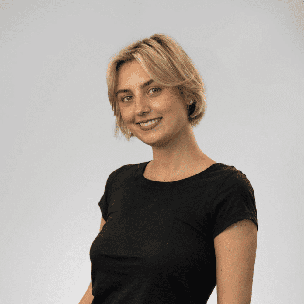Portrait of Maddy Lapava, a professional stylist at Michael Anthony Salon, showcasing their expertise and style.