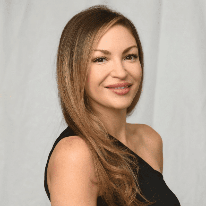 Portrait of Kendra Antonelli, a professional stylist at Michael Anthony Salon, showcasing their expertise and style.