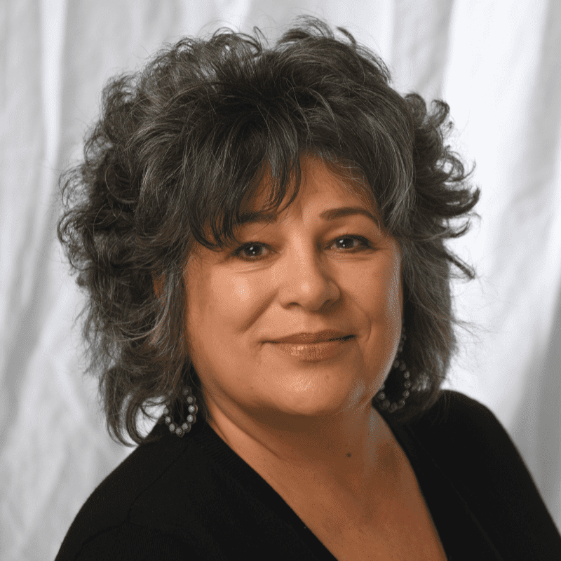 Portrait of Deborah Buonfiglio, a professional stylist at Michael Anthony Salon, showcasing their expertise and style.