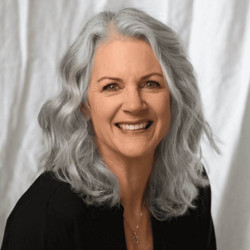 Portrait of Shannon Christensen, a professional stylist at Michael Anthony Salon, showcasing their expertise and style.