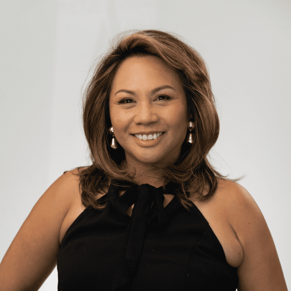 Portrait of Cheryl Lagman, a professional stylist at Michael Anthony Salon, showcasing their expertise and style.